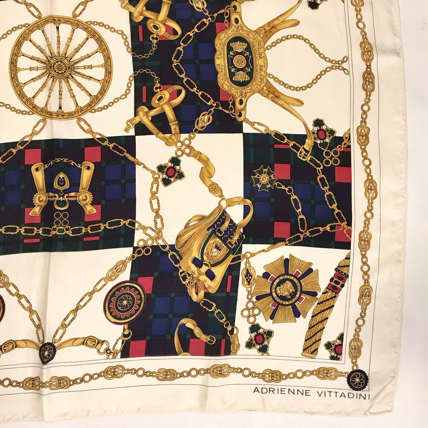 Adrienne Vittadini Silk Scarf in Red, Blue and Gold on Cream Background, Print of Chains, Medals and Saddlebags Design. Square 33 inches.